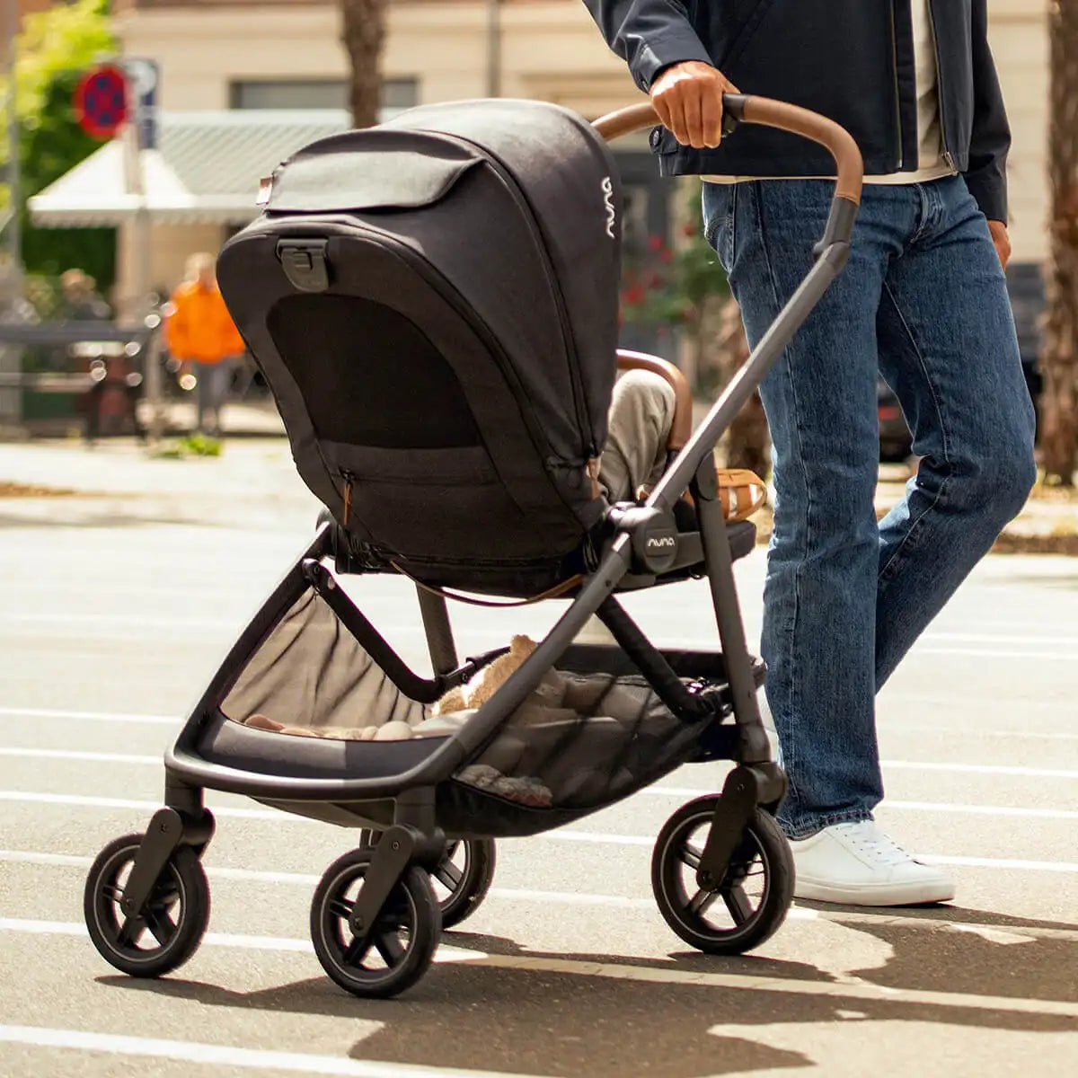 Nuna SWIV Stroller | 360° Swivel Wheels - Cedar