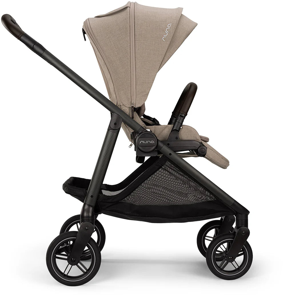 Nuna SWIV Stroller | 360° Swivel Wheels - Acorn