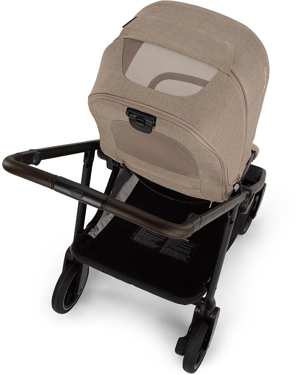 Nuna SWIV Stroller | 360° Swivel Wheels - Acorn