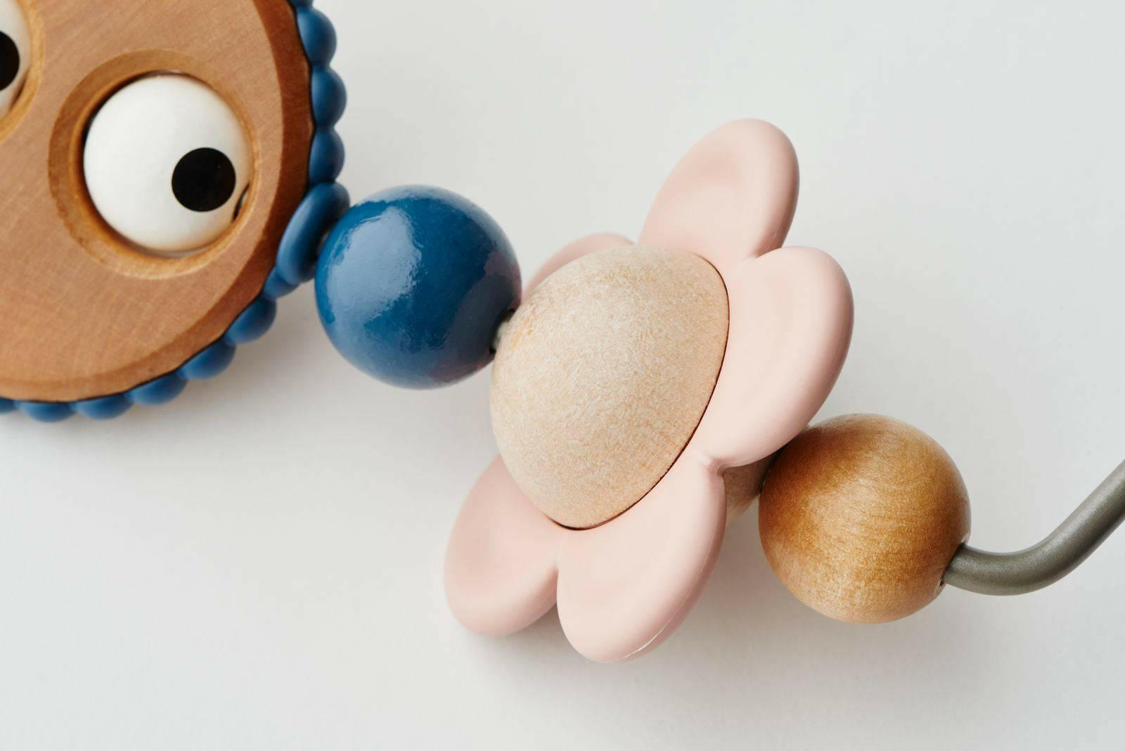 Baby Bjorn Babysitter Balance Wooden Toy Bar - Pastels - Traveling Tikes 